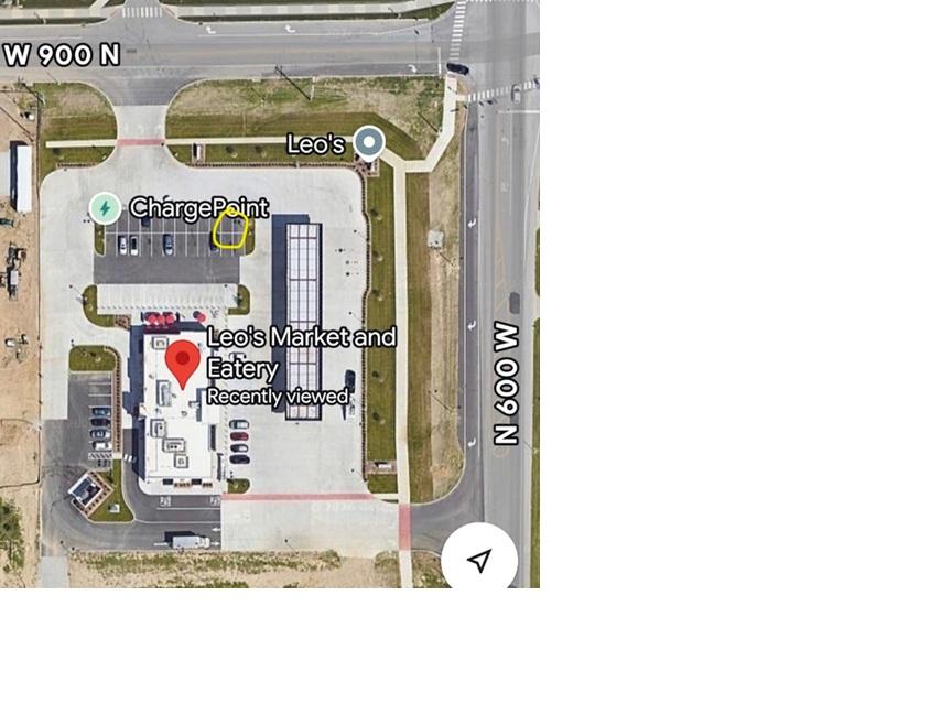 Aerial map of Leo's Market and Eatery showing approved parking location marked with yellow circle